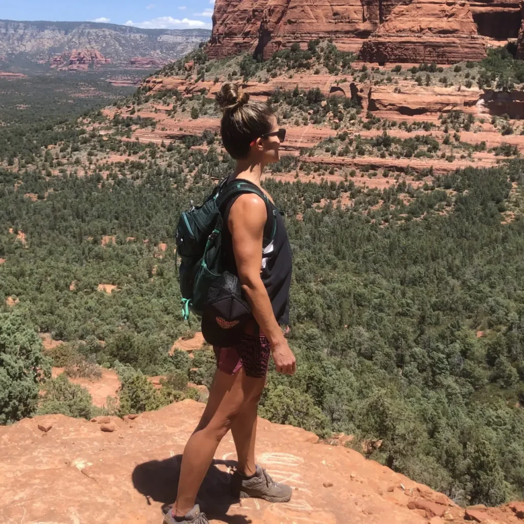 Gina looking over a valley